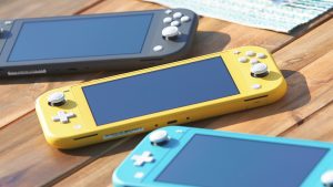 Nintendo Switch Lite consoles on a table.
