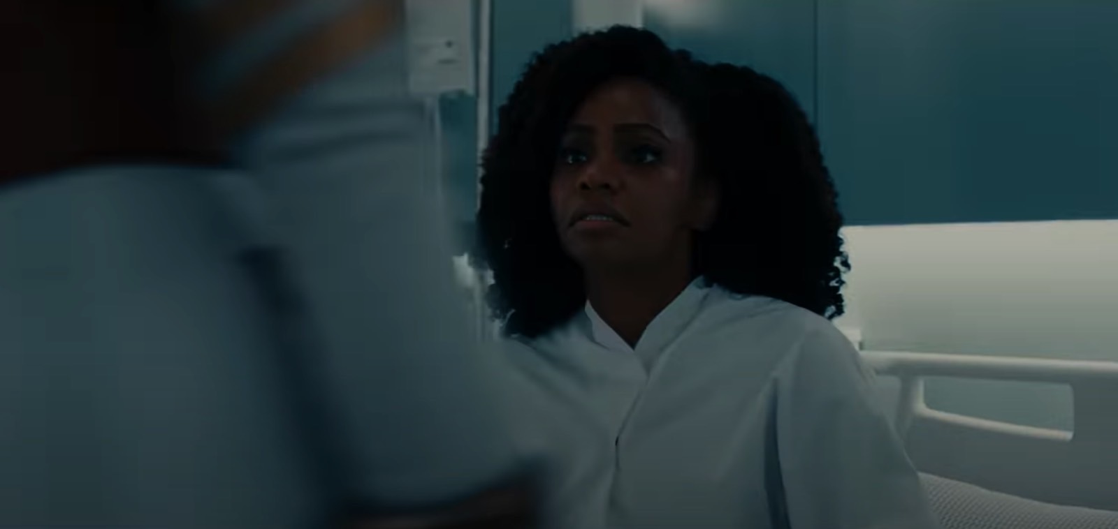 Monica Rambeau (Teyonah Parris) looking up at someone in The Marvels promo clip.